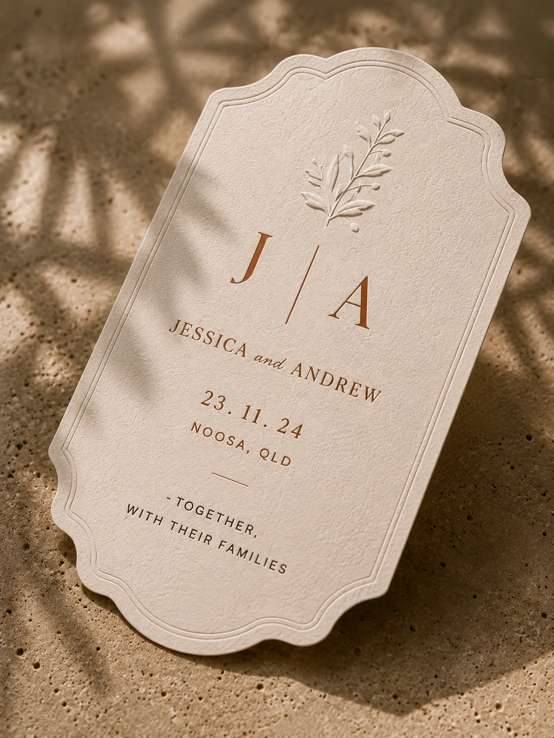 Embossed wedding invitation with copper lettering